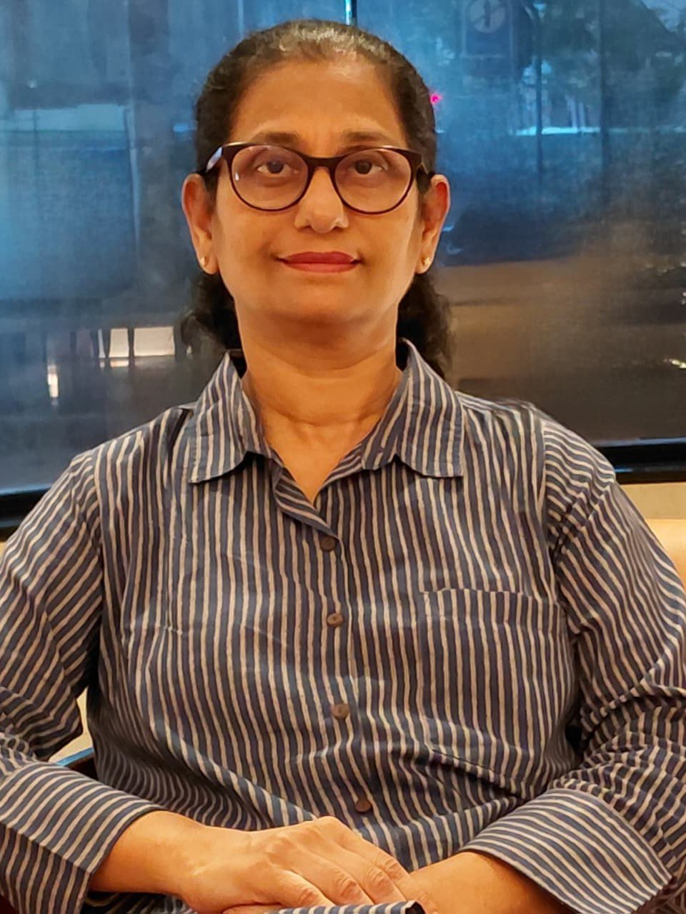 Professional portrait representing Dr. Archana Thakur